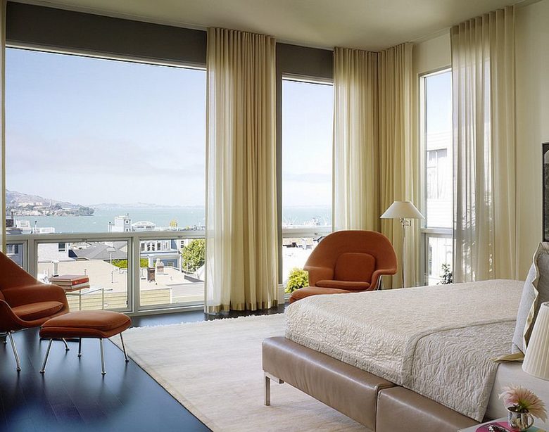 Gorgeous curtains bring an air of femininity to the bedroom