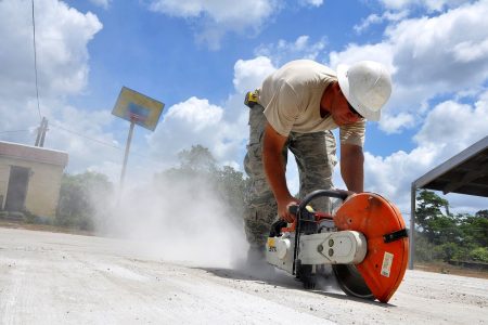 The Benefits Of Concrete Cutting 1 worker using a concrete hand saw