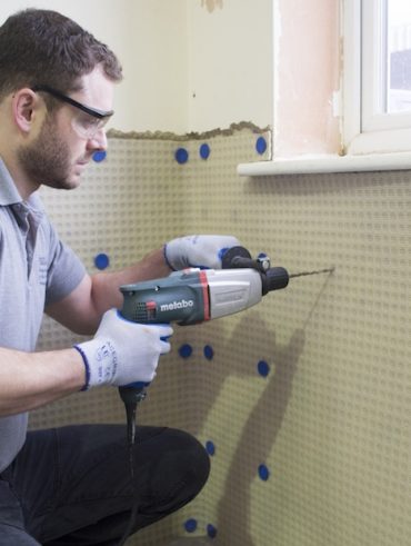 Damp proofing walls with membrane