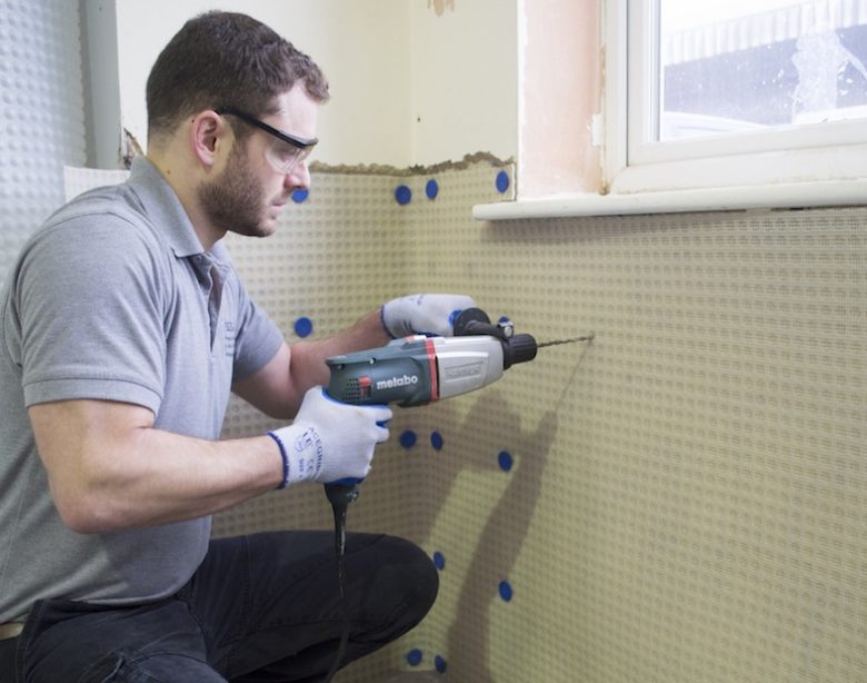 Damp proofing walls with membrane