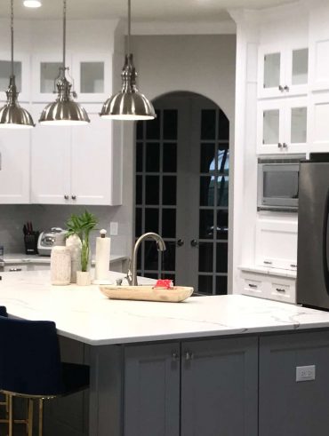 Modern Mission Viejo kitchen remodel with marble flooring and open layout