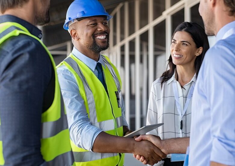bigstock Smiling engineer shaking hands 353866670 1110x550 1